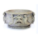 A LATE 20TH CENTURY OVAL WHITE COMPOSITE JARDINIERE decorated with mermaids and mask decoration 50cm