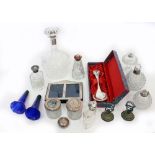 A SELECTION OF SILVER to include a silver rimmed cut glass globular decanter, cut glass scent