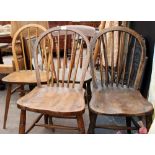 FOUR SPINDLE BACK KITCHEN CHAIRS one stamped Dancer and Herne Bros., Ltd. 1953 another stamped H. S.