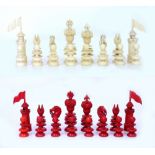 A 19TH CENTURY ENGLISH CARVED AND TURNED IVORY CHESS SET by Charles Hastilow, the Queen 9.cm in