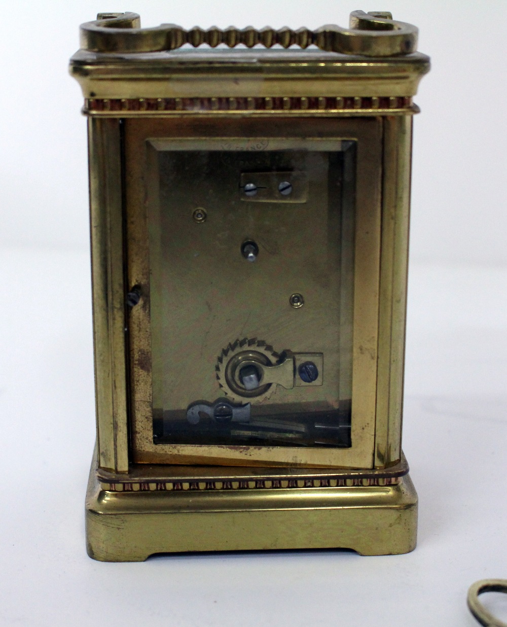 A LATE 19TH / EARLY 20TH CENTURY FRENCH BRASS CARRIAGE CLOCK with white enamel dial marked 'The - Image 3 of 3