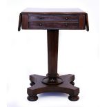 A VICTORIAN MAHOGANY WORK TABLE drop ends and two frieze drawers, an octagonal column and four bun