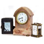 AN ALABASTER CASED MANTLE CLOCK together with two carriage clocks and an associated case (3)