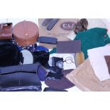 A COLLECTION OF VINTAGE CLOTHING a leather collar case etc