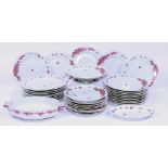 A 20TH CENTURY LIMOGES PORCELAIN PART DINNER SERVICE to include 18 large dinner plates, 11 smaller