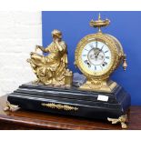 A FRENCH GILT METAL MANTLE CLOCK the enamelled dial with Roman numerals, overall 49cm wide x 20cm