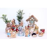 A COLLECTION OF VINTAGE PENDELFIN RABBIT FIGURE GROUPS, a tiered stand, cobble cottage etc (a
