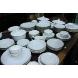 AN EXTENSIVE ROYAL DOULTON GOLD CONCORD PATTERN PORCELAIN DINNER SERVICE and further china