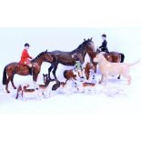 A COLLECTION BESWICK PORCELAIN ANIMALS and figurines consisting of a hunter and huntress on