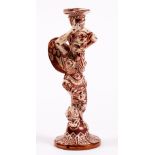 A SINGLE ITALIAN CANTAGALLI CANDLE STICK with lustre painted decoration of a mythical creature, with