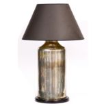 A SILVERED GLASS CYLINDRICAL TABLE LAMP with ebonised turned base 22cm wide x 56cm high overall