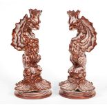 A PAIR OF ITALIAN CANTAGALLI POTTERY FIGURAL CANDLESTICKS with over painted lustre decoration and