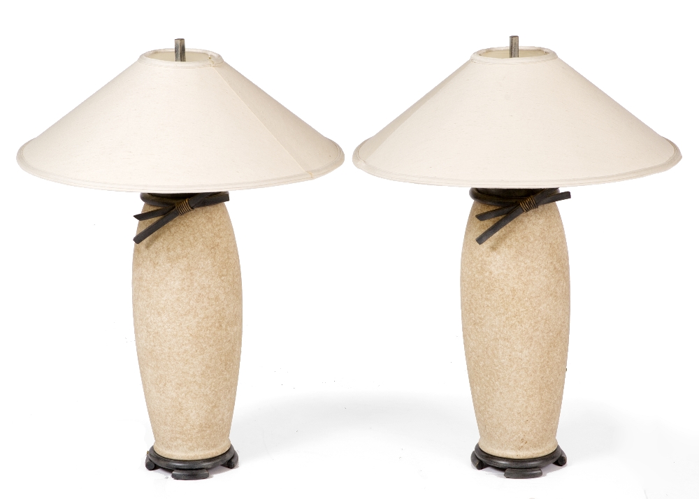 A PAIR OF CRACKLE GLAZE POTTERY TABLE LAMPS with bronzed metal mounts and shallow conical shades