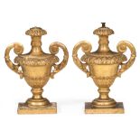 A PAIR OF ANTIQUE ITALIAN CARVED GILTWOOD TABLE LAMPS in the form of half round classical urns