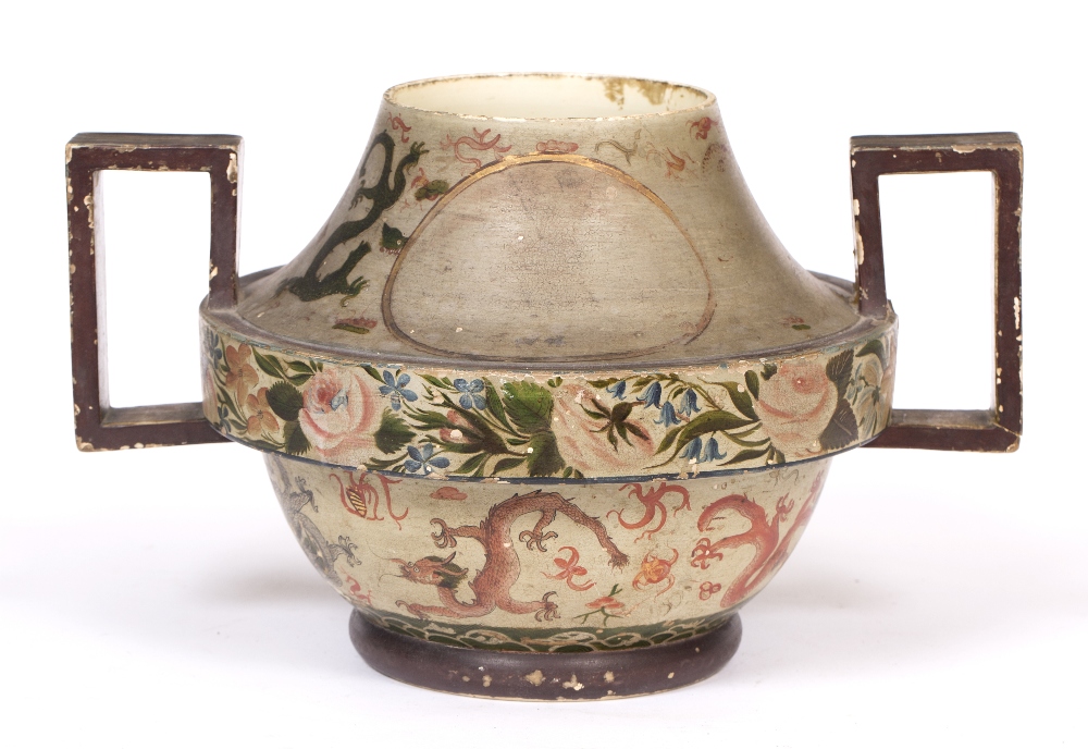 A VICTORIAN POTTERY VASE of squat ovoid form and rectangular handles with painted decoration in