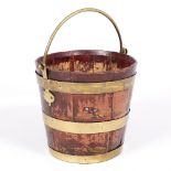 AN 18TH CENTURY BRASS BOUND COOPERED BUCKET with hinged handle and red lacquered chinoiserie