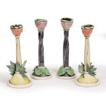 A PAIR OF CONTEMPORARY POTTERY CANDLESTICKS attributed to Anna Lambert with leaves moulded and