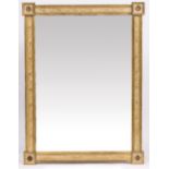 A 20TH CENTURY ITALIAN GILT FRAMED MIRROR with outset corners, painted decoration and flower head