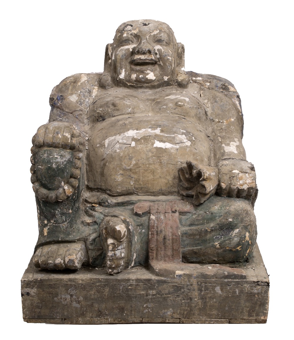 A LARGE CARVED GESSO AND PAINTED SCULPTURE depicting a laughing budda (losses and damages), 105.