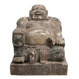 A LARGE CARVED GESSO AND PAINTED SCULPTURE depicting a laughing budda (losses and damages), 105.