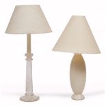 A CUT GLASS TABLE LAMP with faceted stem and circular spreading base together with a white pottery