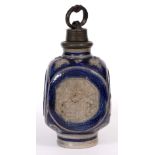 A 17TH CENTURY GERMAN WESTERWALD STONEWARE WINE FLASK with four sides with sprigged decoration of