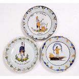 A PAIR OF EARLY 19TH CENTURY FRENCH TIN GLAZED FAIENCE DISHES in coloured enamels decorated with a