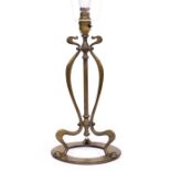 AN EARLY 20TH CENTURY BRASS TABLE LAMP of Art Nouveau form, in the manner of W.A.S. Benson 35.5cm