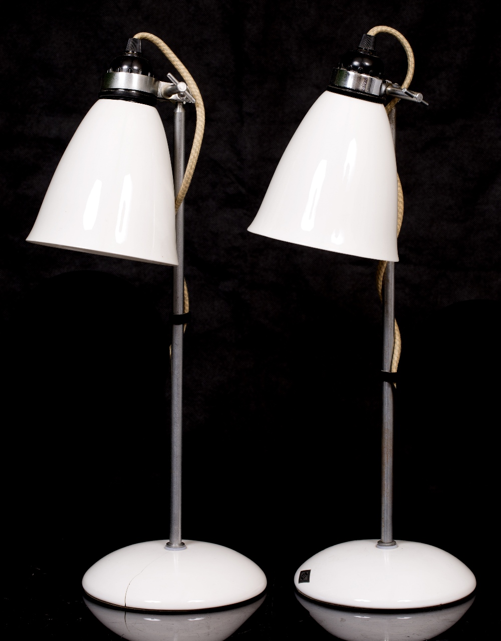 A PAIR OF BTC HECTOR DESK LAMPS in silvered steel and white porcelain, each 47cm high, one base