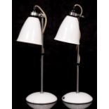 A PAIR OF BTC HECTOR DESK LAMPS in silvered steel and white porcelain, each 47cm high, one base