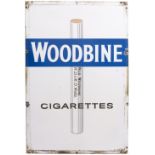 AN OLD ENAMEL ADVERTISING SIGN for 'Woodbine' cigarettes 61cm wide x 92cm high