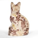 A LATE 18TH / EARLY 19TH CENTURY STAFFORDSHIRE POTTERY CAT decorated with manganese brushed spots