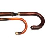 A LATE 19TH / EARLY 20TH CENTURY CROOK HANDLED WALKING CANE the bamboo effect sliding sectional