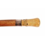 AN EARLY 18TH CENTURY IVORY HANDLED WALKING CANE the handle carved with the initials R.S. and date