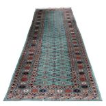 A PAKISTANI RUNNER 98cm x 300cm and a smaller Pakistani rug (2)