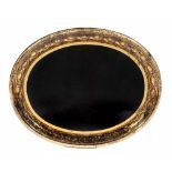 A REGENCY BLACK LACQUERED PAPIER MÂCHÉ OVAL TEA TRAY with greek key border within a blood red