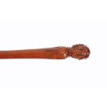 A MID 19TH CENTURY BOXWOOD SINGLE PIECE WALKING CANE the handle well carved as a head and