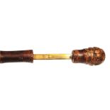 A LATE 19TH / EARLY 20TH CENTURY BAMBOO CANE with burr wood handle, the shaft concealing a boxwood