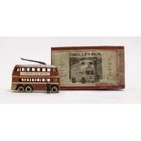 A TAYLOR & BARRETT DIE CAST TROLLEY-BUS No. 204 complete with miniature conductor and original if