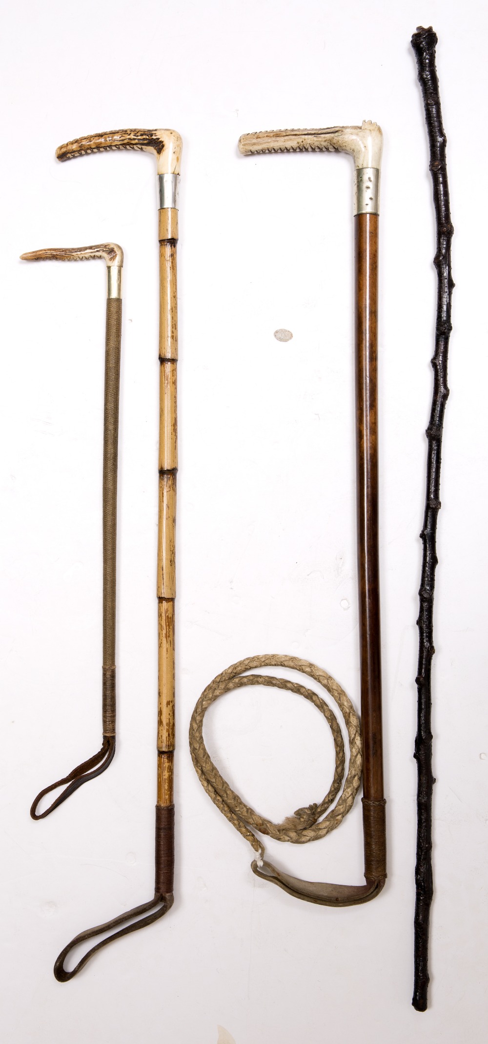 A SMALL GROUP OF RIDING CROPS and a walking stick - Image 2 of 2