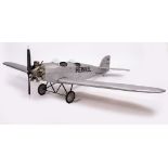 A FLYING SCALE MODEL of a Heinkel HE18, the wood framed structure with fabric covering and