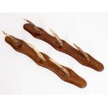 A PAIR OF OAK MOUNTED ANTLER TIP COAT HOOKS 7.5cm wide x 56cm high (2)