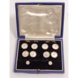 A CASED SET OF 9CT GOLD MOTHER OF PEARL AND ENAMEL DECORATED CUFFLINKS shirt and collar studs,