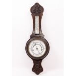 AN EARLY 20TH CENTURY OAK CASED WHEEL BAROMETER unsigned and undated 69cm overall