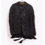 A VICTORIAN LACE OPERA JACKET with repeating embellished motif and two silk shawls (3)