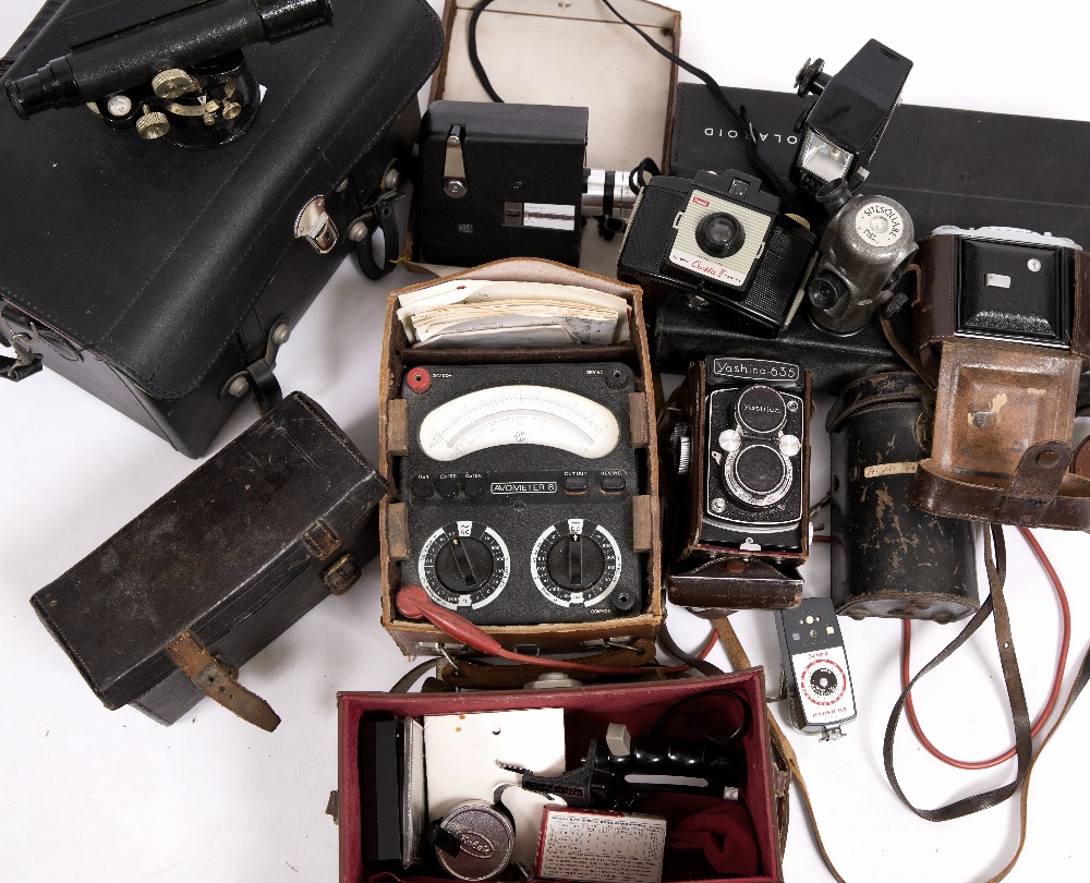 AN E.R. WATTS & SON SURVEYORS LEVEL together with cameras to include a polaroid camera and a Yashica