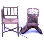 AN EARLY 19TH CENTURY BOBBIN TURNED CORNER CHAIR and a wicker child's saddle, 57cm wide x 63cm