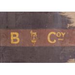 A FRAMED MILITARY FLAG reputedly from the World War I trenches in blue and red with B Coy and