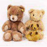 A SMALL MERRY THOUGHT PLUSH TEDDY BEAR 12cm high together with a modern Steiff bear and a further
