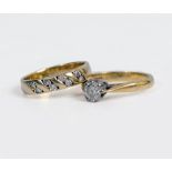 TWO DIAMOND SET RINGS comprising a single stone ring, the round brilliant-cut diamond in claw